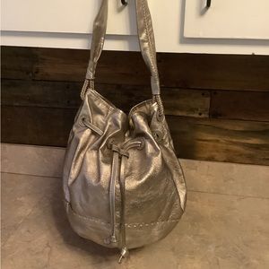 The Sak pewter, leather drawstring bag